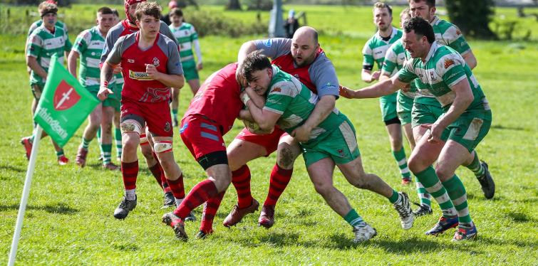 A powerful battle for possession at Dol Wiber. Picture Newcastle Emlyn